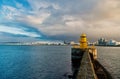 Sea port navigation concept. Sea transportation and navigation. Lighthouse on sea pier in reykjavik iceland. Lighthouse Royalty Free Stock Photo