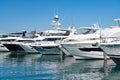 Sea reflecting sunlight at luxury motor yacht boats in South Beach, USA