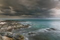The sea rock in rainy season dark clouds Royalty Free Stock Photo