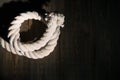 Sea rope on a wooden background. Royalty Free Stock Photo