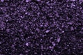 Sea salt background or texture in violet color. Little minerals Royalty Free Stock Photo