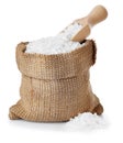 Sea salt in burlap sack isolated on white Royalty Free Stock Photo