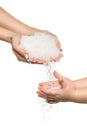 Sea salt crystals in women hand and child hand