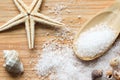 Sea salt crystals in wooden spoon