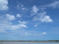 Sea salt fields local farm industry on a beautiful blue sky in Thailand