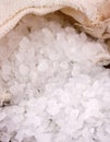 Sea salt in jute sack close up. Stile life concept Royalty Free Stock Photo