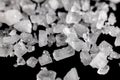 Sea salt micro crystals shooted on a black - macro
