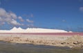 Sea salt piles for harvesting on the island of Bonair Royalty Free Stock Photo