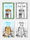 Sea salt posters and banners. Vintage labels. Glass bottles, packaging and and leaves, wooden spoons, powdered powder
