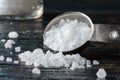 Sea Salt Crystals Spilled fromm a Teaspoon Royalty Free Stock Photo