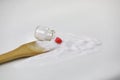 Grains of Natural Sea salt from a Upside down Glass bottle with red love