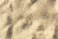 Sea sand background texture, top view, shadow on the sand Royalty Free Stock Photo