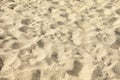 Sea sand background texture, top view, shadow on the sand Royalty Free Stock Photo