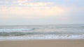 The sea on the sand beach bright sky