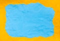 Sea and sand made from blue yellow plasticine. concept holiday texture  beach sea border background Royalty Free Stock Photo
