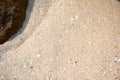 Sea sand and rocks Straight beach Sand surface, coarse grain, flaky