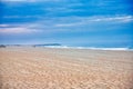 Sea sand sky and summer day. Summer background. The sea and the beach under the blue sky and white clouds. Tropical beach in the Royalty Free Stock Photo