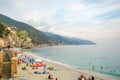 The sea and sandy beach Spiaggia di Fegina at the Cinque Terre Italy resort village of Monterosso al Mare Royalty Free Stock Photo