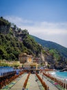 The sea and sandy beach Spiaggia di Fegina at the Cinque Terre Italy resort village of Monterosso Royalty Free Stock Photo