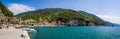 The sea and sandy beach Spiaggia di Fegina at the Cinque Terre Italy resort village of Monterosso Royalty Free Stock Photo