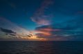 Sea scape, Sun set at sea for background with dark cloud and blue sky in the gulf of Thailand Royalty Free Stock Photo