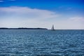 Sea scenery with a blue waves and yacht