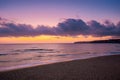 Beautiful landscape of sandy beach in purple dusk