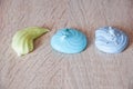 Sea shell dessert. trendy french cookies flat lay. meringue top view background. green and blue color candy. sumer vacation on bea Royalty Free Stock Photo