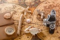 Sea shells, a compass, a wooden pencil and an old camera