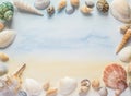 Sea shells frame on a pastel watercolor sea background