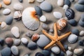 Sea shells on the sand. Starfish sea stones and seashells background. Royalty Free Stock Photo