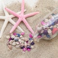 Sea shells and starfish on sand Royalty Free Stock Photo