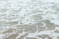 Sea shore foamy water Royalty Free Stock Photo