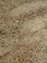 Sea shore sand background texture on the beach Royalty Free Stock Photo