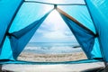 Sea shore view from a camping tent Royalty Free Stock Photo