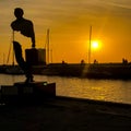 Sculpture in the sea side, sunset with sculpture