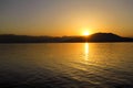 Sea, sky, sunset on horizon of mediterranean coast. Amazing sunset vibes on edge ocean. Sunrise over sea. Beautiful landscape. Royalty Free Stock Photo