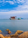 sea , sky and wreck fishing boat