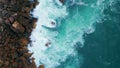 Sea splashing coastal stones aerial view. Ocean water breaking rocks seashore. Royalty Free Stock Photo