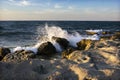 Sea spray on the rocks of the shore in the evening light of the sunset. 5 Royalty Free Stock Photo