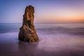 Sea stack in the Pacific Ocean at sunset, at El Matador State Be Royalty Free Stock Photo