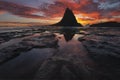 Sea Stack, Tidal Pool Reflections and Sunset at Martin`s Beach Royalty Free Stock Photo