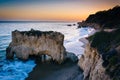 Sea stack and view of the Pacific Ocean at sunset, from cliffs a Royalty Free Stock Photo