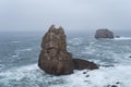 Sea stacks carved out by wave action in the Cantabrian Coast with rough weather