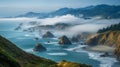 Sea Stacks Emerging from Fog Along a Rugged Coastline Royalty Free Stock Photo