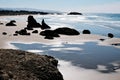 Silhouetted sea stacks along the coast near Bandon Oregon Royalty Free Stock Photo