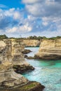 Sea stacks of Torre Sant\'Andrea created by the erosive power of wind and waves Royalty Free Stock Photo