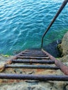 Sea stairs blue water green black view