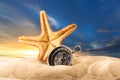 Sea star and compass in sand on sunset Royalty Free Stock Photo