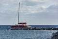 By Sea stones along the sails sailing catamaran